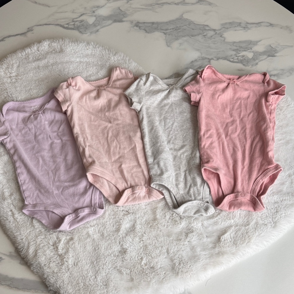 Bundle of 4 Carters Bodysuits